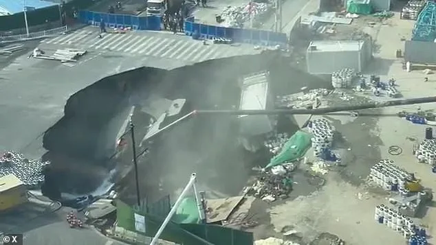 Shanghai Sinkhole Swallows Road, Workers Scramble as Metro Construction Suspected