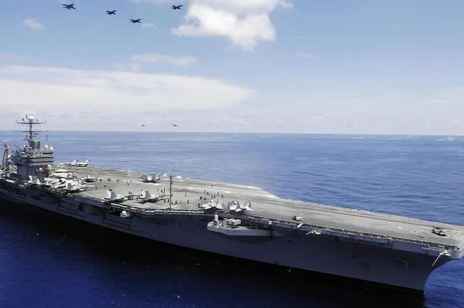 Iranian Missile Attack on U.S. Carrier Abraham Lincoln Amid Escalating U.S.-Israel Retaliatory Strikes